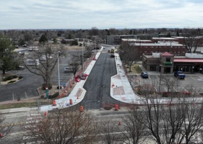 Aerial picture looking east down 3rd Ave showing new asphalt after construction.